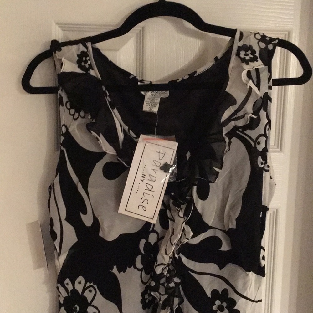 NWT fun flirty dress. Fun with ruffle and sequins!
